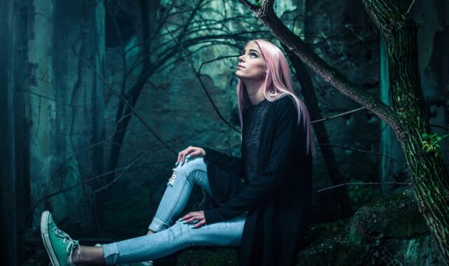 young woman, portrait, woods, fashion, hairstyle, nature, style, stylish woman, sit, sitting, forest, trees, look up, looking up, female, adult, footwear, model, outdoors, woman