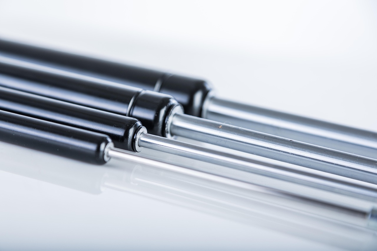 gas springs, gas struts, gas shock, gas-filled springs, air springs, air struts, air shock, compression, tension, force, piston, rod, seal, vapor, extend, retract, stroke, and pressure, end fittings, mounting brackets, rod clevises