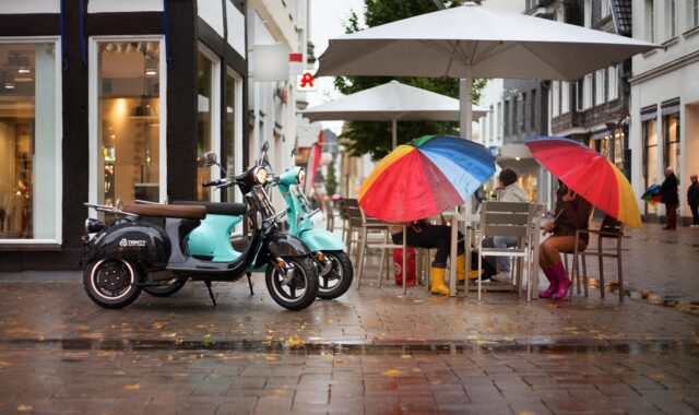 electric scooter, scooter, nature, street, rain, umbrella, woman, cafe, conversation, retro