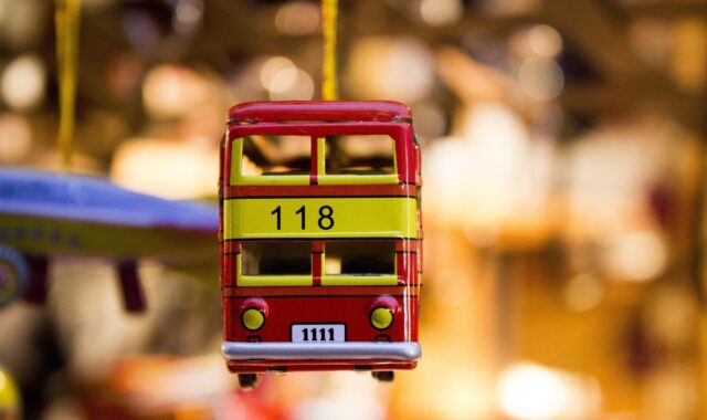 toy car, souvenir, bus, vehicle, toy, decoration, decor, decorative, close up, bus, bus, bus, bus, bus